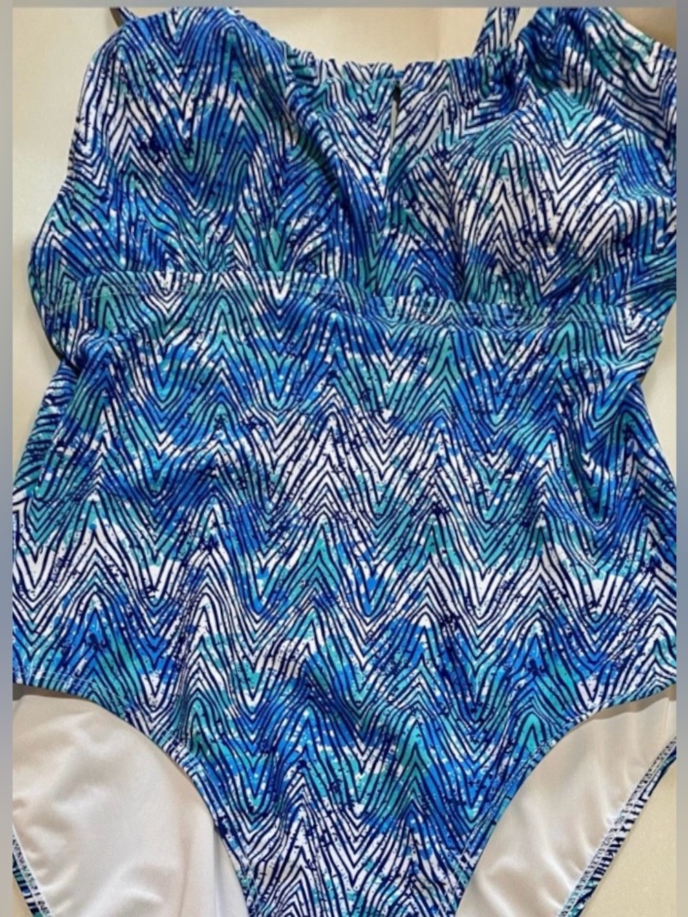 Tahari 1 piece Bathing Suit. Size Large. Vibrant blues & greens. NWT. Key Hole